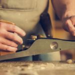 man-hold-wood-planer-374861