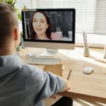 boy-in-gray-hoodie-looking-at-imac-4144530